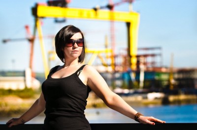 This was an experiment out in the full and hard direct sunlight. Lora was facing almost directly into the sun which is why I asked her to wear her sunglasses as squinting isn't attractive in a portrait. With such an iconic Belfast backdrop who could resist shooting it?